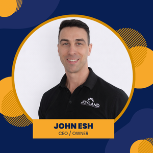 John Esh, CEO/Owner, smiling in a circular portrait with blue and orange background elements.