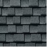 Dark gray asphalt roof shingles.