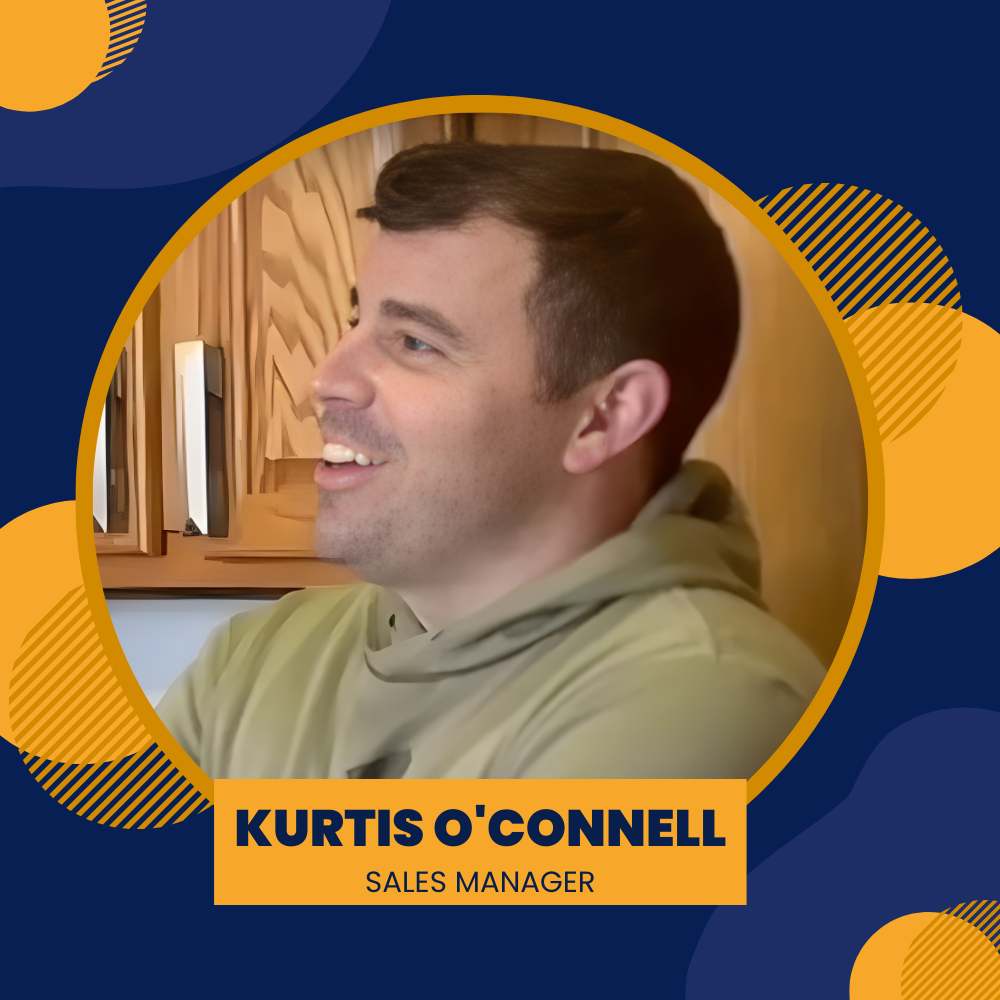 Kurtis O'Connell, sales manager, smiling, in a green hoodie, within a yellow circle on a blue background.