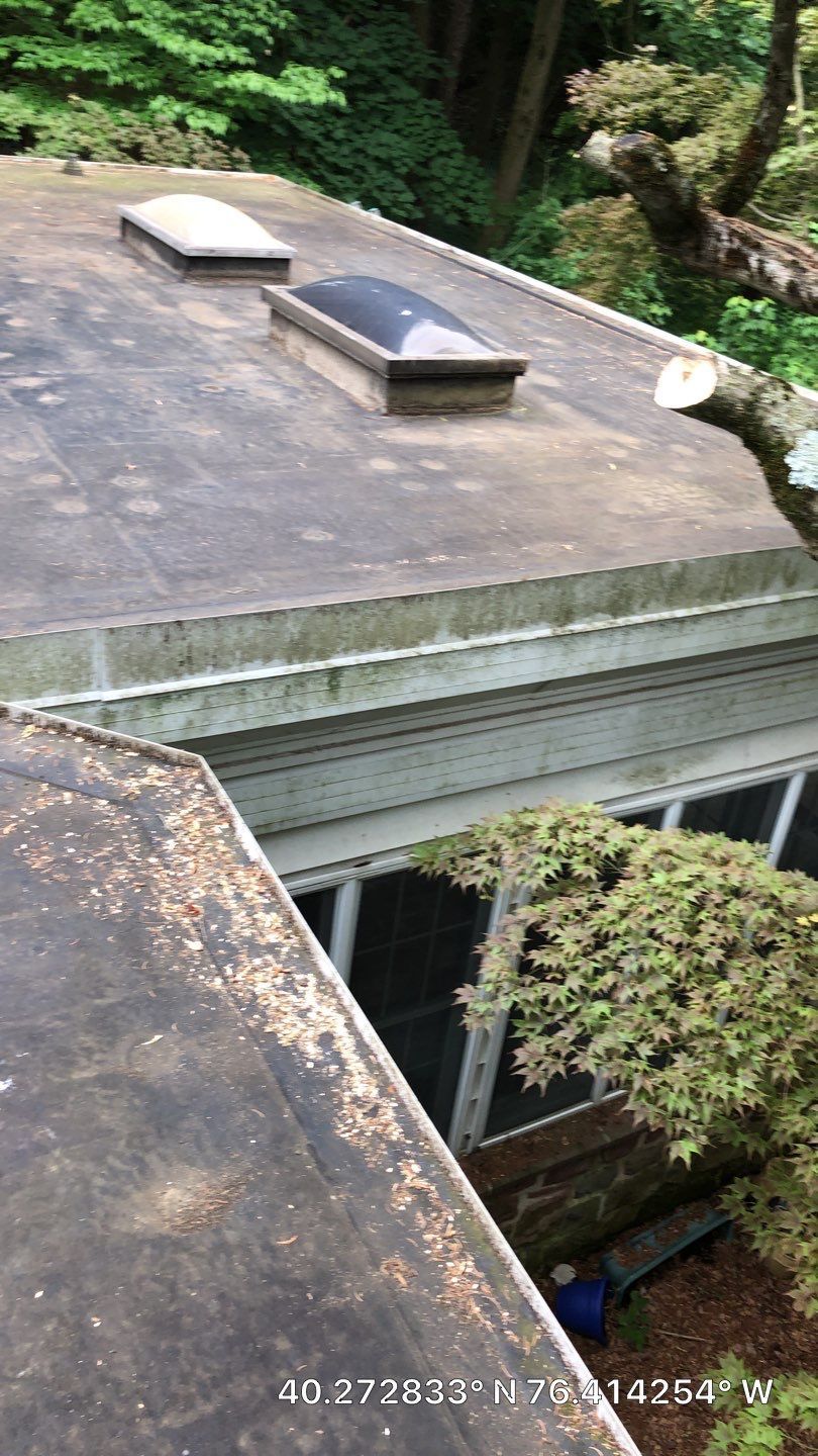 Flat roof with skylights inspected for wear and maintenance on Burd Coleman Road in Cornwall, PA.