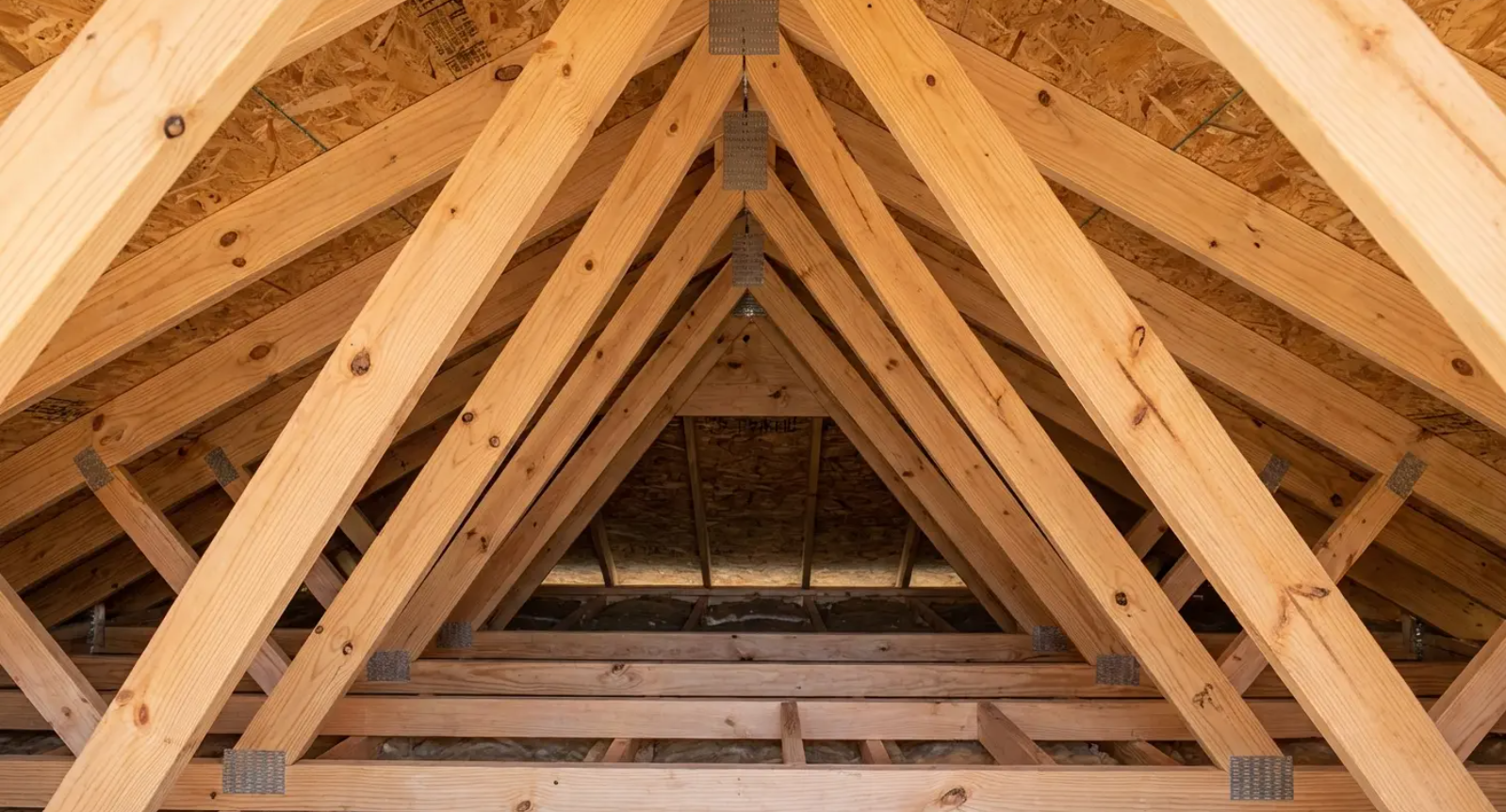 Roof shingles being installed. Text overlay: