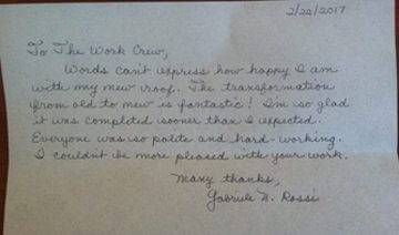 Handwritten thank-you note to a work crew; expresses happiness with a new roof and compliments the workers' politeness.