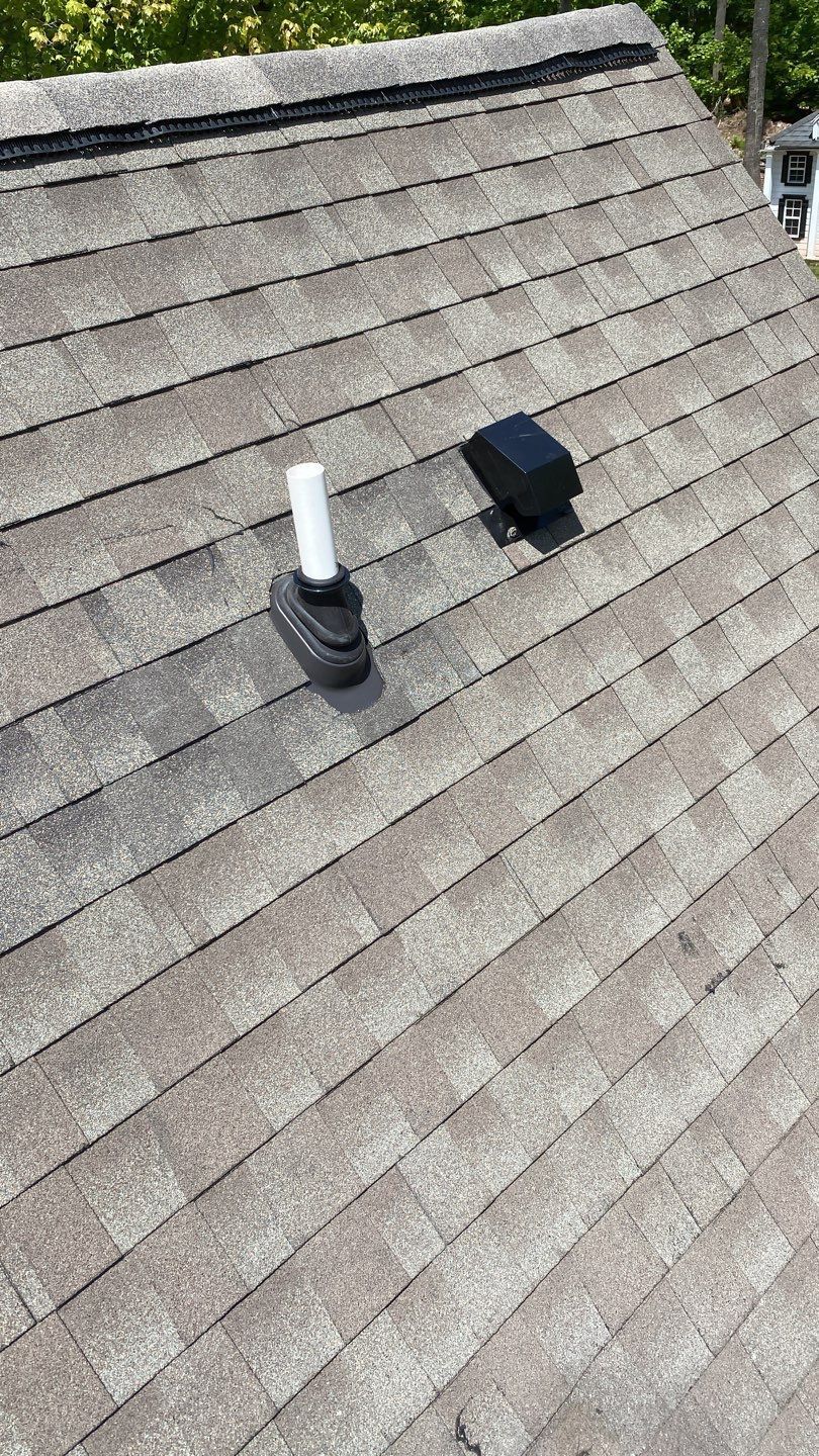 New roof vent flashing installed on an architectural shingle roof in Mountain Lane, Cornwall, PA.