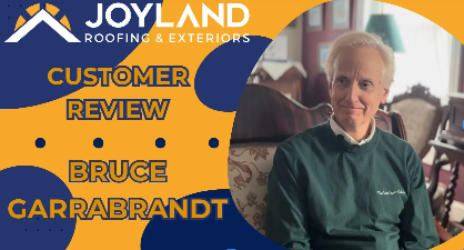 Customer review featuring Bruce Garrabrandt for Joyland Roofing & Exteriors. Man in green sweater sits indoors.