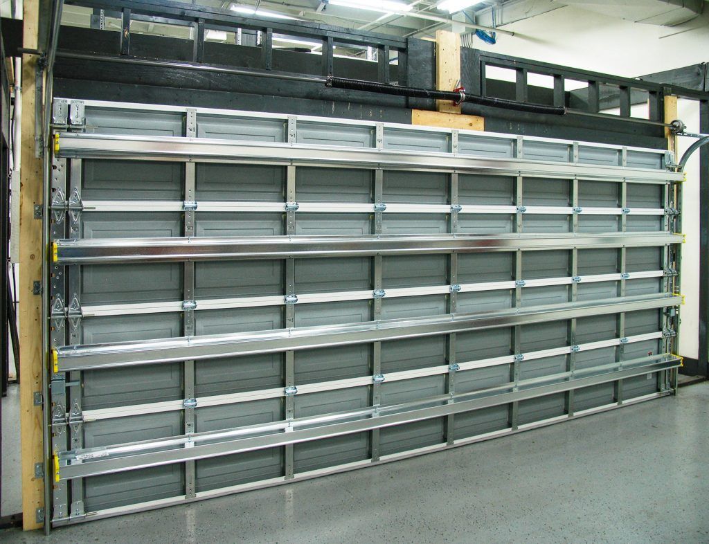 residential garage door with hurricane brackets and reinforcement for high velocity wind storms and hurricanes in Sarasota