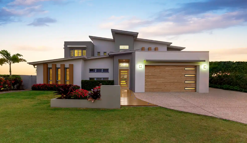 Steel double car garage door with modern smooth finish and plank design with contemporary windows in Bradenton, FL