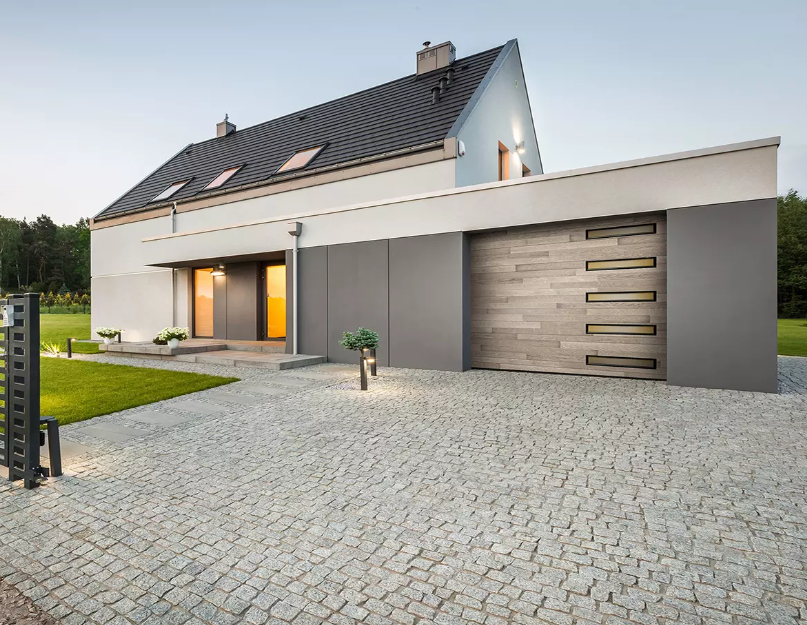 single car garage door with plank design and slim clear windows with black frames going down one side in Sarasota, FL