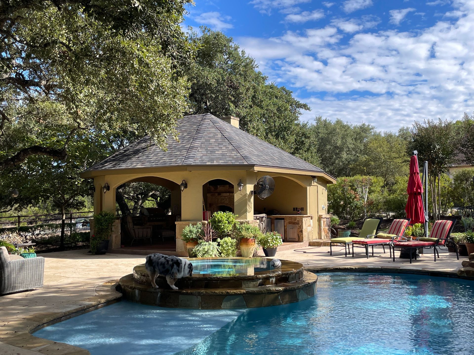 A house with a for sale sign in front of it