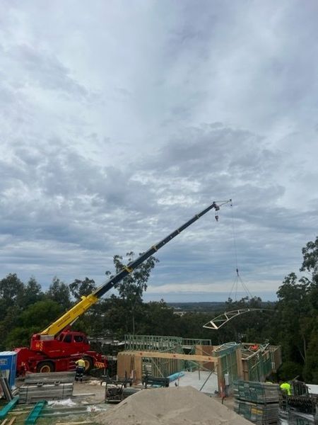 A Construction Site With a Crane and a Concrete Pump — CA Crane Hire in Maroochydore, QLD