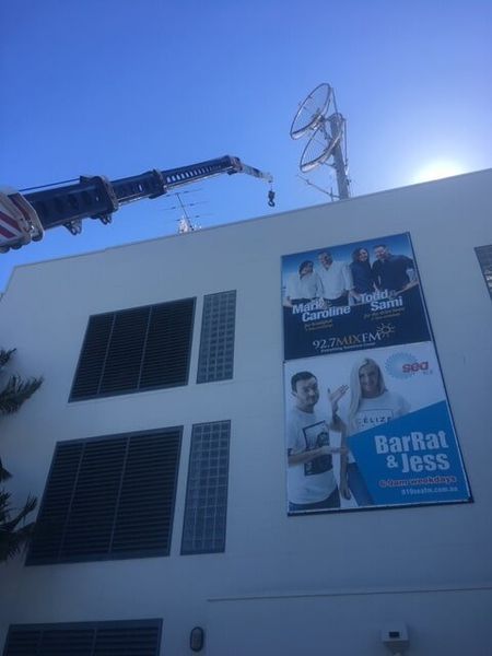 A Large Sign on the Side of a Building Says BarRat & Jess — CA Crane Hire in Forest Glen, QLD