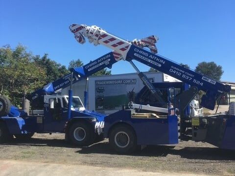 A Blue Truck With a Crane Attached to It is Parked in a Parking Lot — CA Crane Hire in Forest Glen, QLD