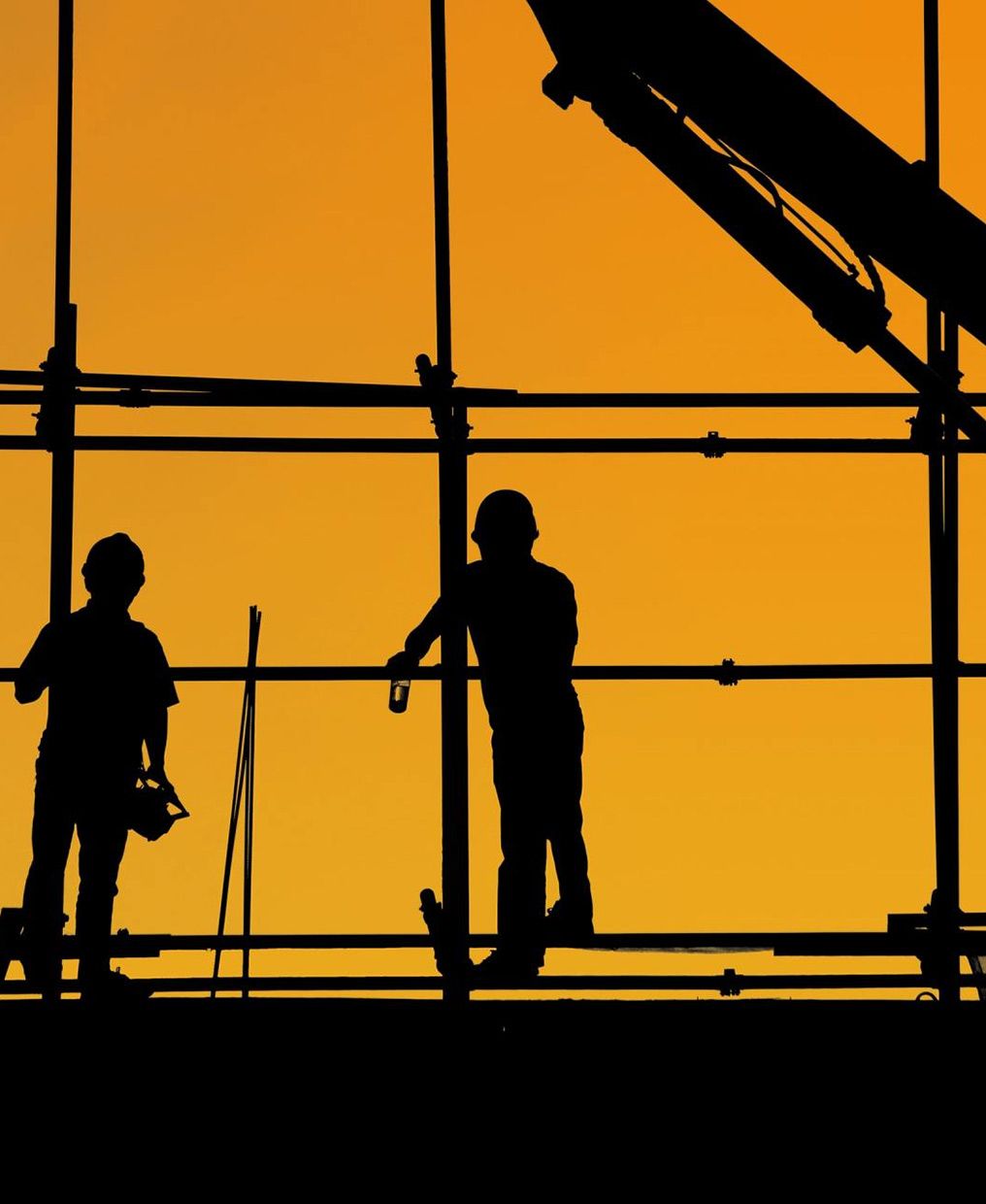 Two Construction Workers Are Standing on a Scaffolding at Sunset — CA Crane Hire in Forest Glen, QLD