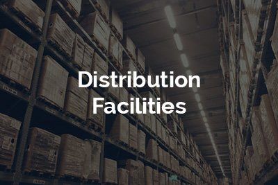 A warehouse filled with lots of boxes and the words `` distribution facilities ''.