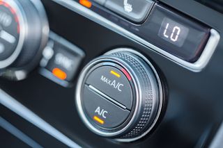 Close-up of a car climate control dial showing 