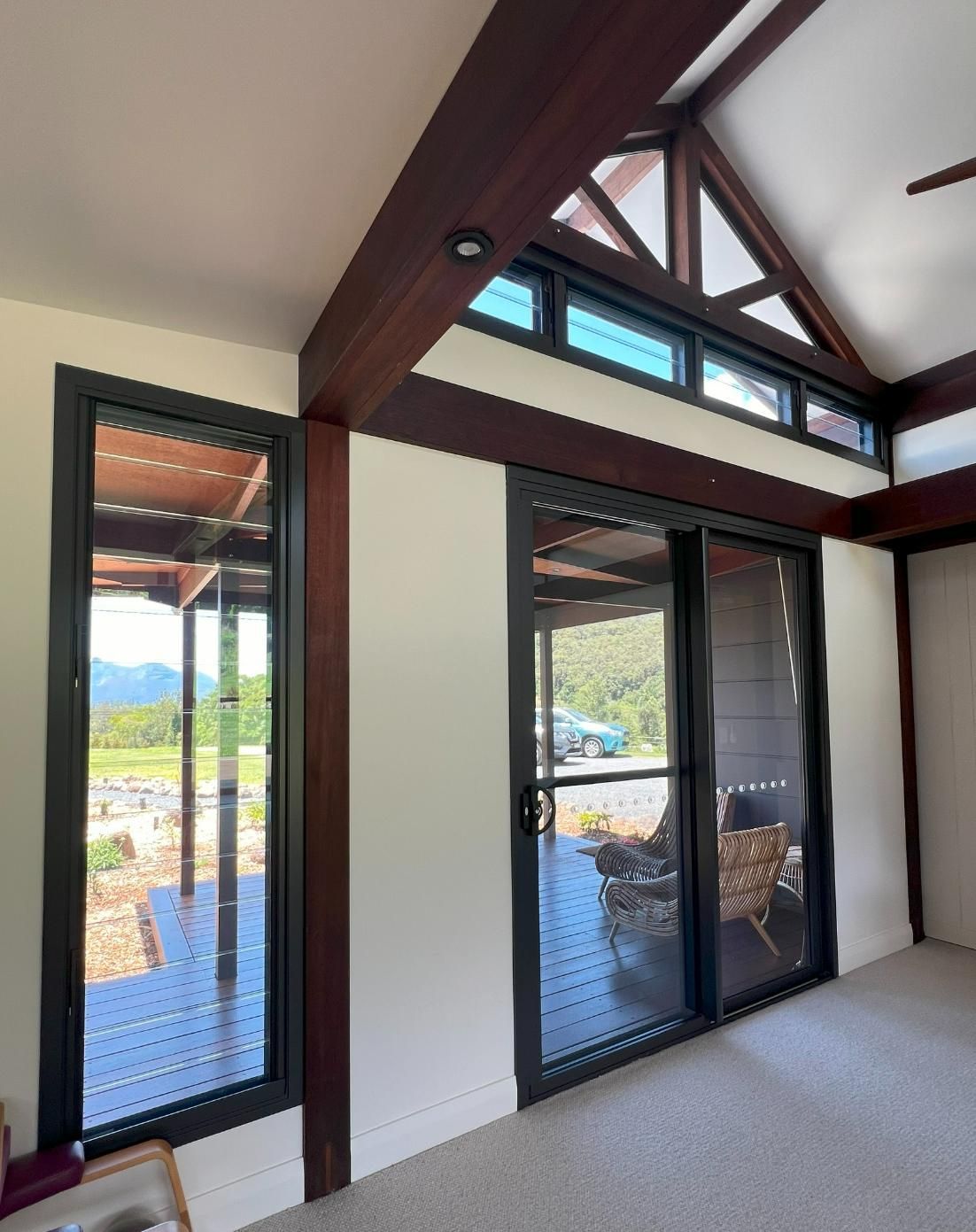 A Room With A Lot Of Windows And A Vaulted Ceiling — Datco Windows & Doors Pty Ltd In Kyogle, NSW