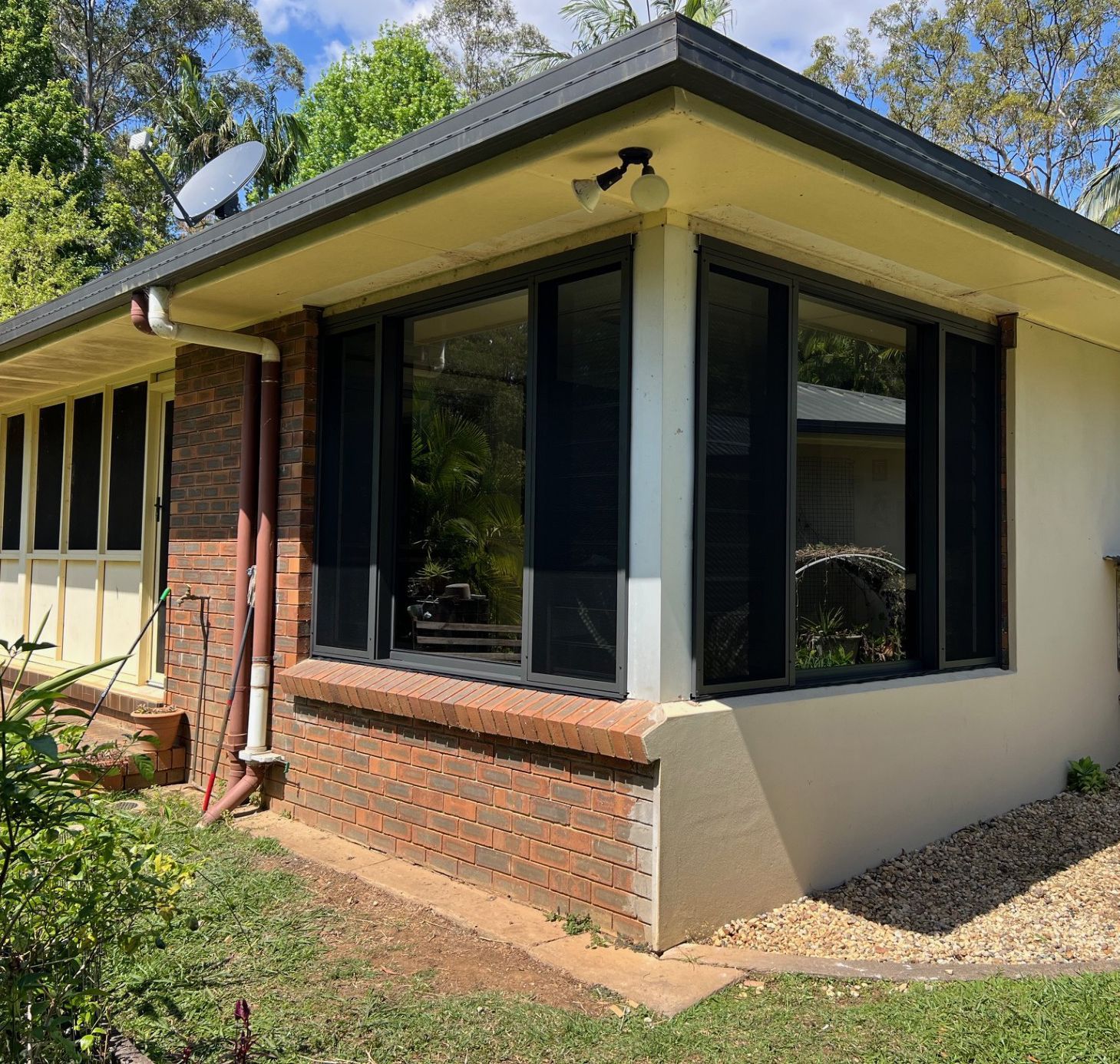 Exterior View of a House With Brick and Large Windows — Datco Windows & Doors Pty Ltd In South Murwillumbah, NSW