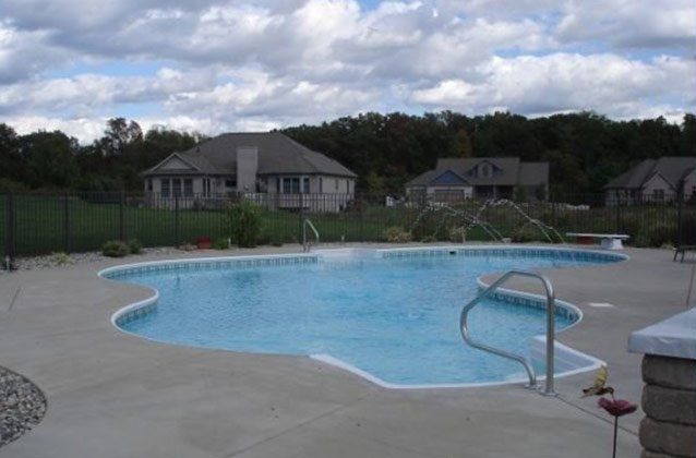 Pool Near Houses — Kalamazoo, MI — Mark’s Pool Services LLC