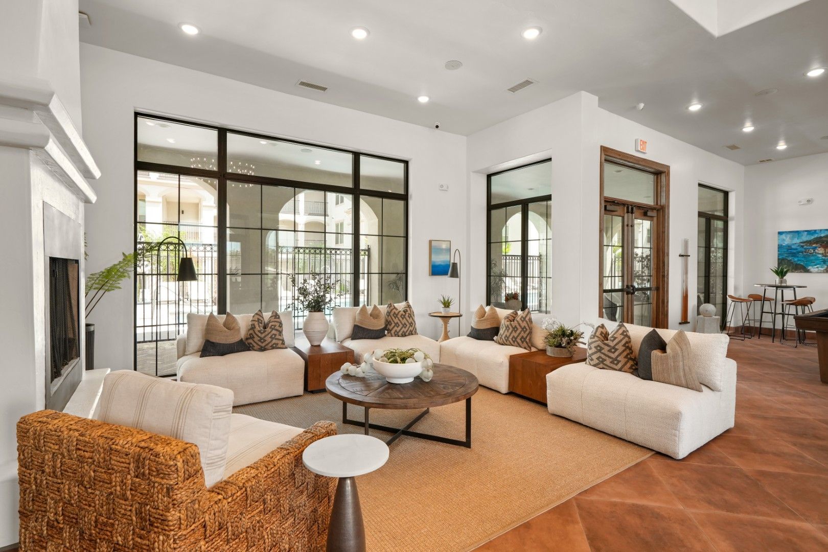 A living room filled with furniture and a fireplace.