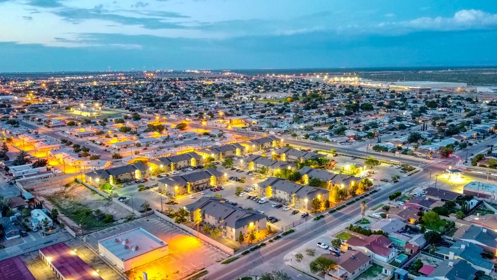 An aerial view of a residential area at night.