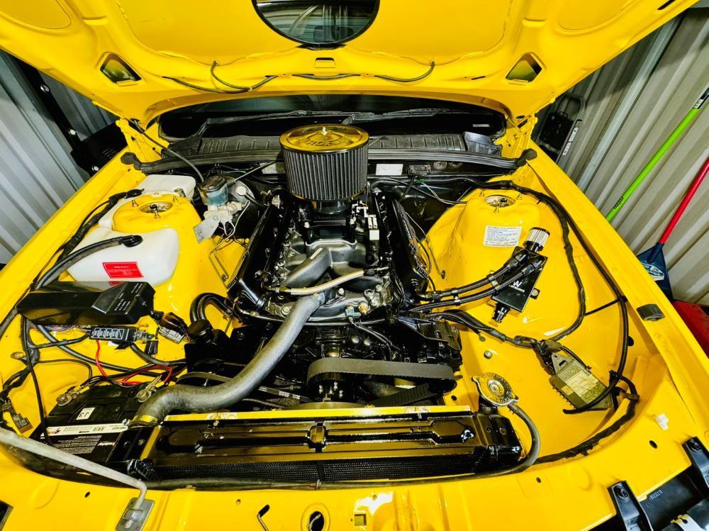 A Yellow Car Engine — Wellers Automotive & Performance in Urangan, QLD