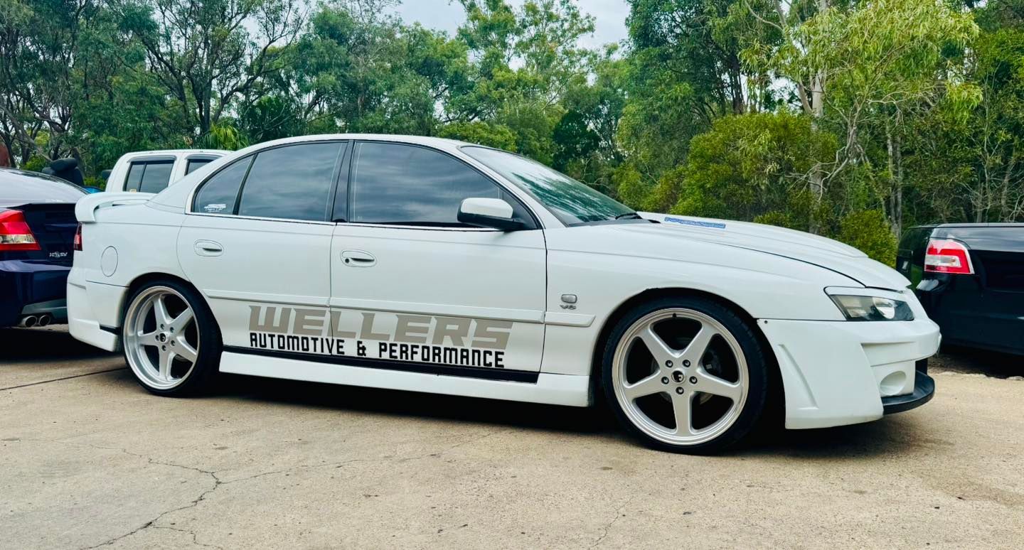 A White Car is Parked — Wellers Automotive & Performance in Torquay, QLD
