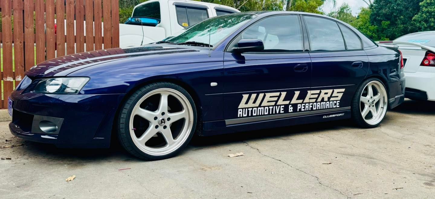 A Dark Blue Car is Parked — Wellers Automotive & Performance in Urangan, QLD