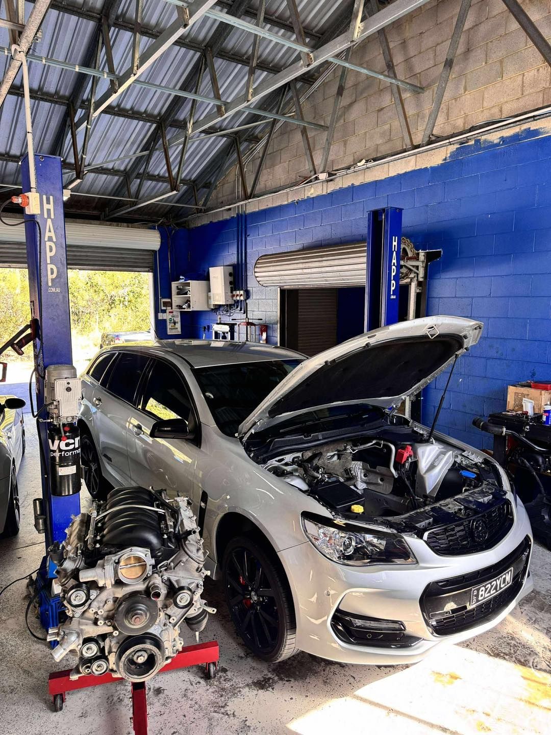 A Yellow Car Engine — Wellers Automotive & Performance in Urangan, QLD