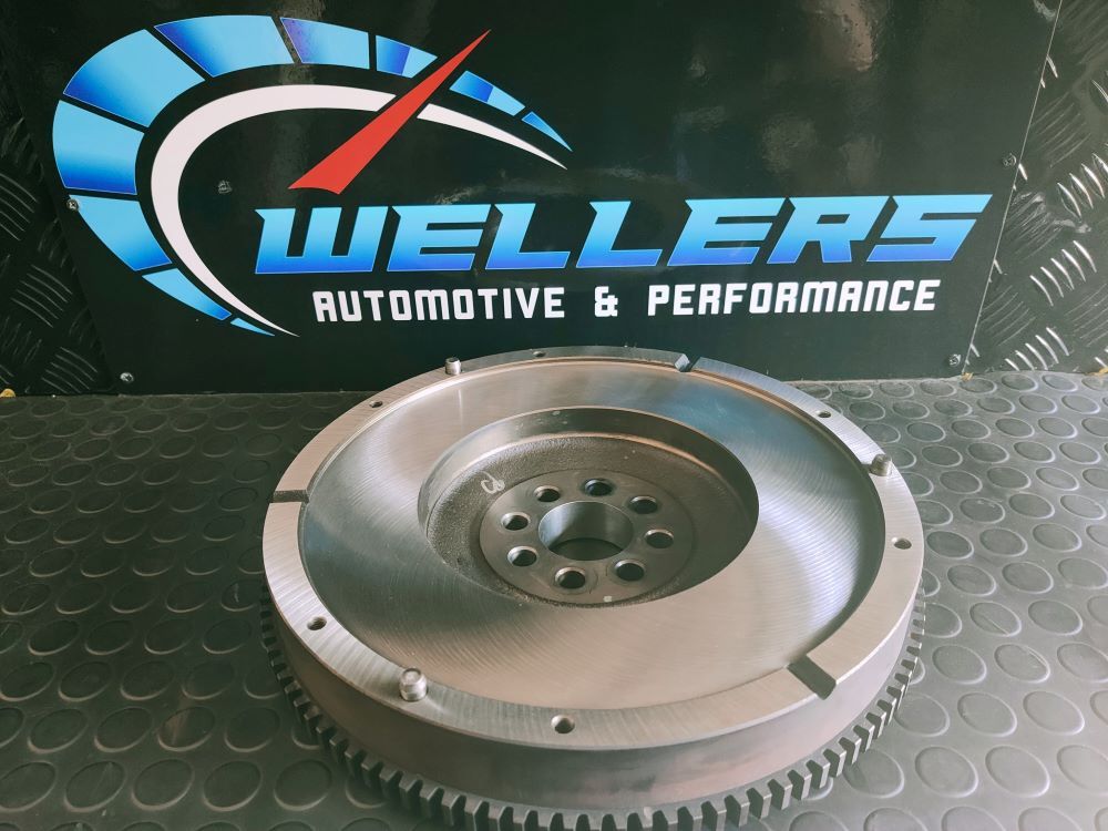 A Metal Flywheel With Gear Teeth — Wellers Automotive & Performance in Urangan, QLD