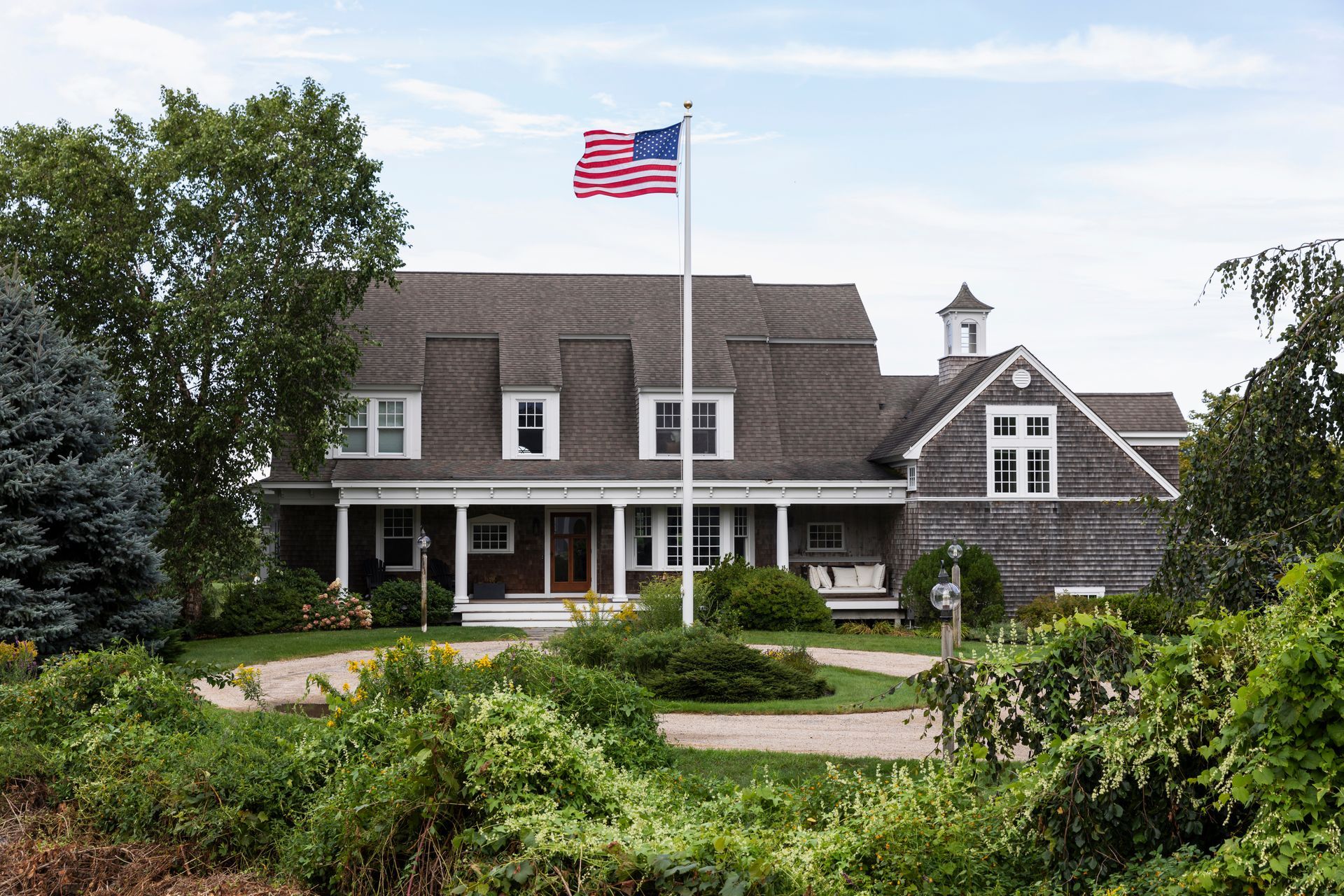 A house with a flagpole.
