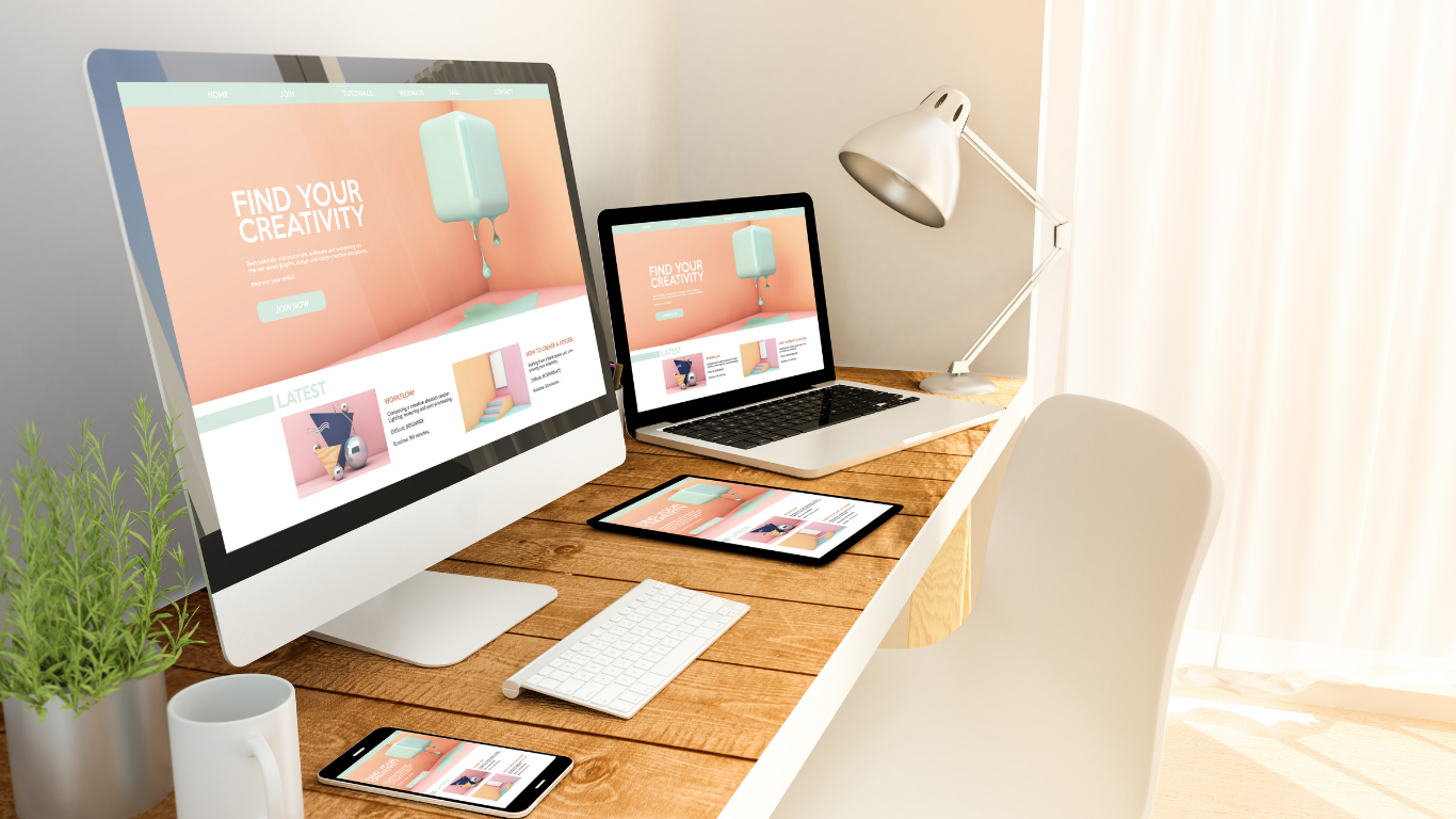 A desk with a computer , laptop , tablet and phone on it.