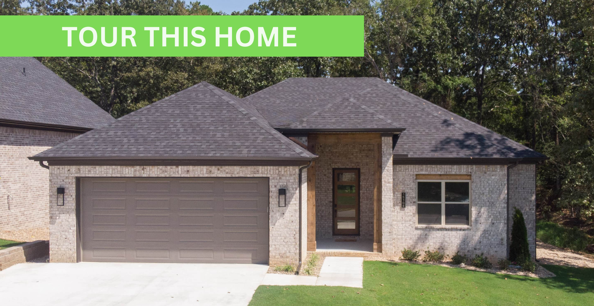 new construction home that is two story and lighter exterior colors. full of windows for natural light