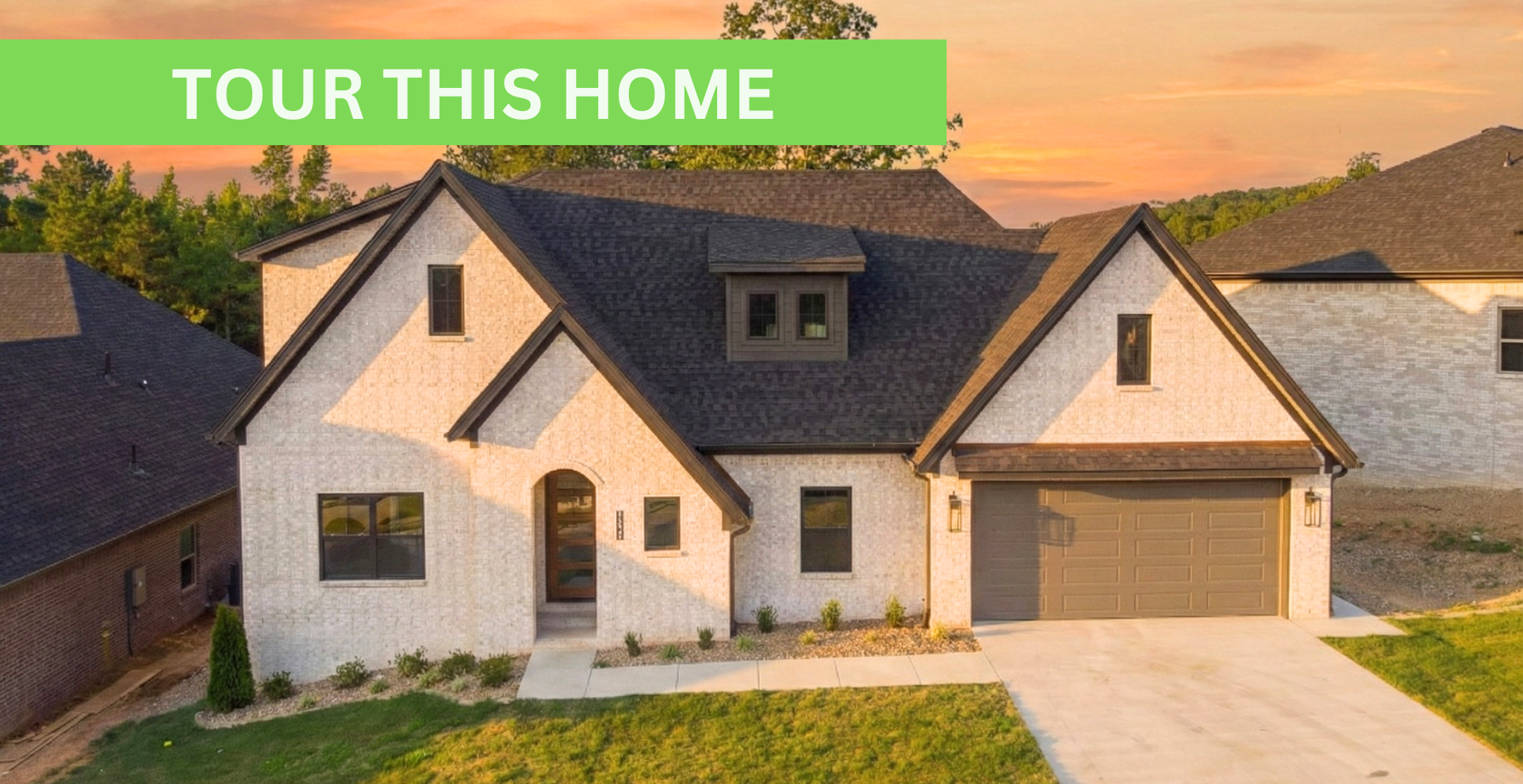 new construction home that is two story and lighter exterior colors. full of windows for natural light