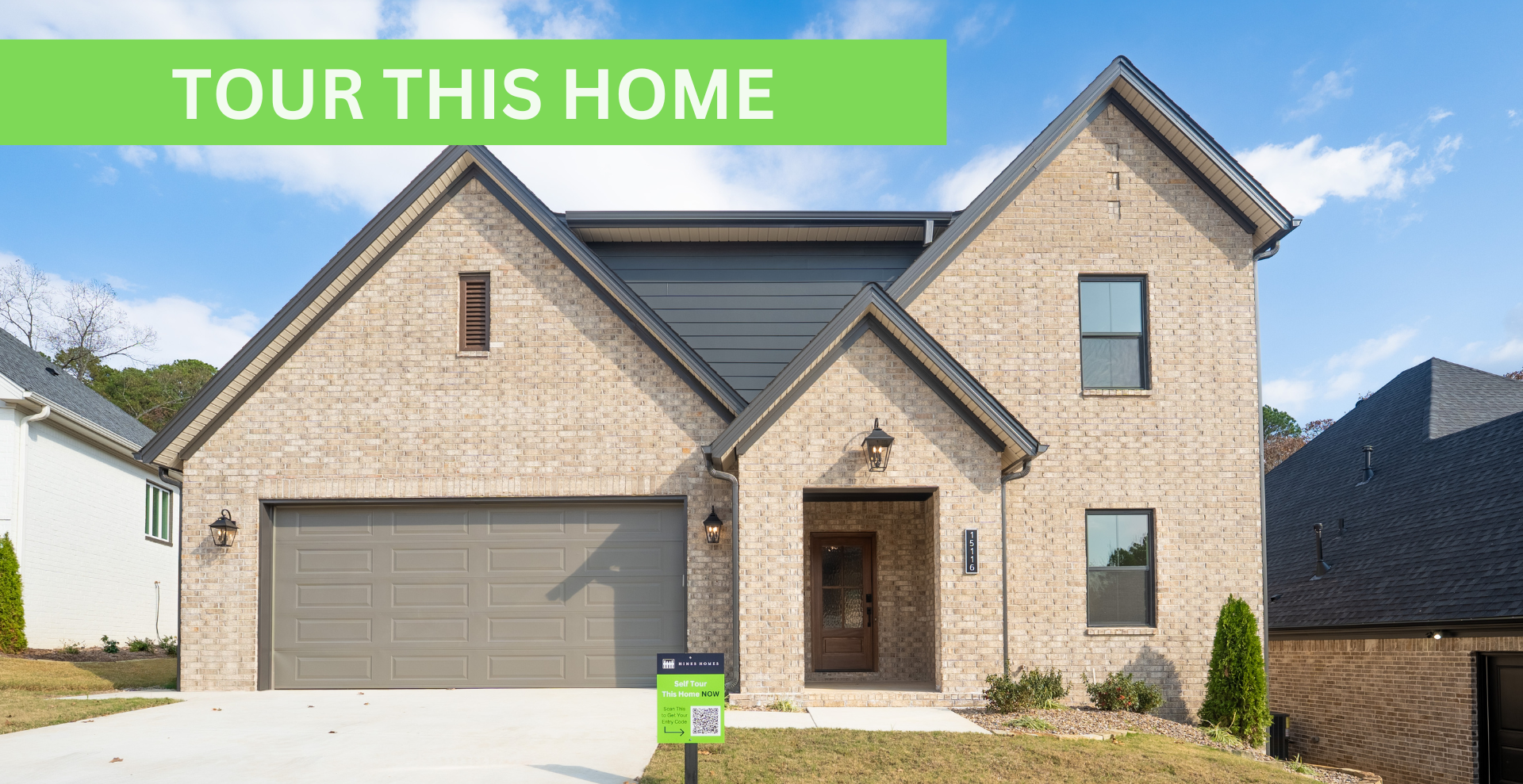 new construction home that is two story and lighter exterior colors. full of windows for natural light