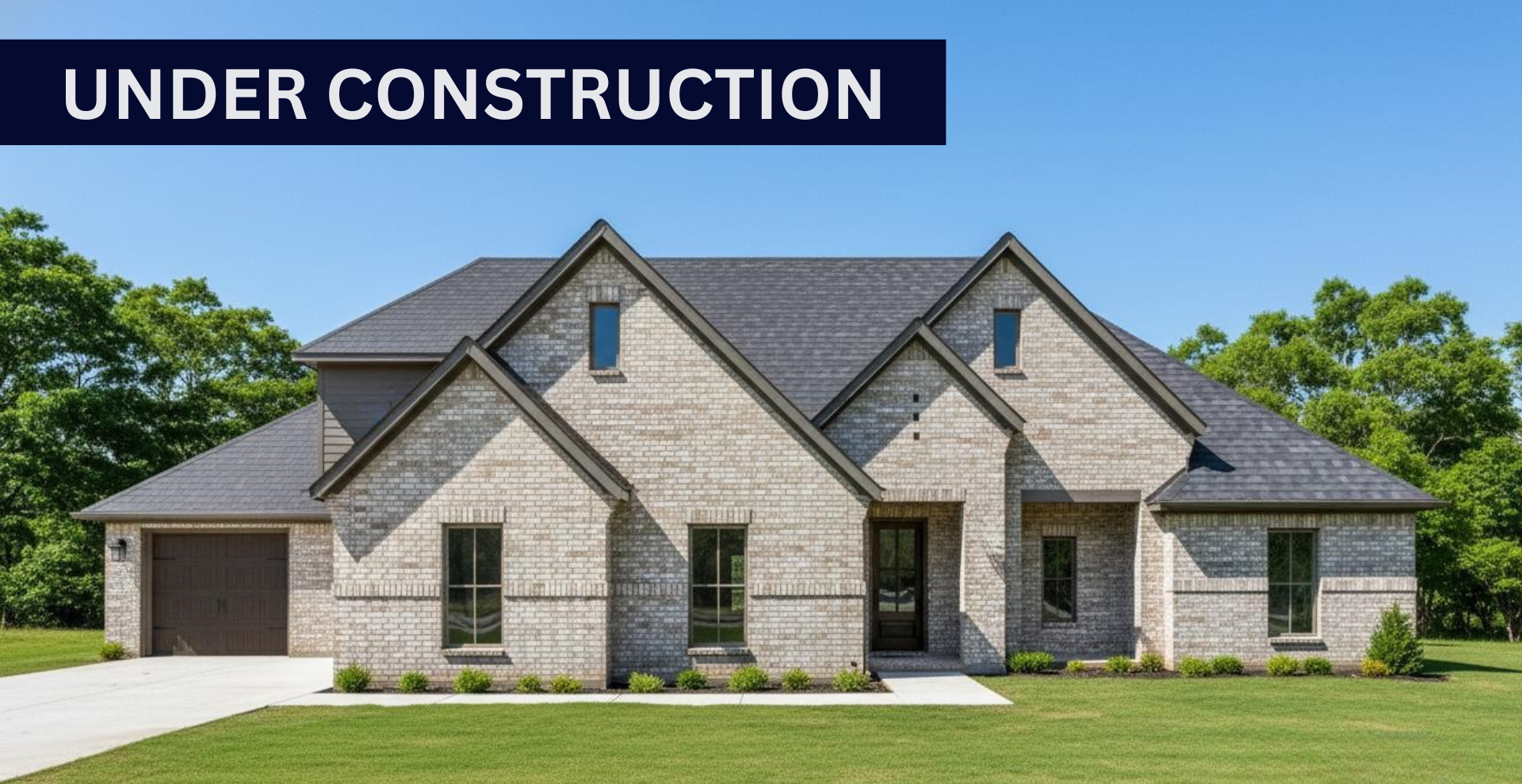 Simple custom home built by hines homes with dark brick and a white accent wall out front with a curved front porch