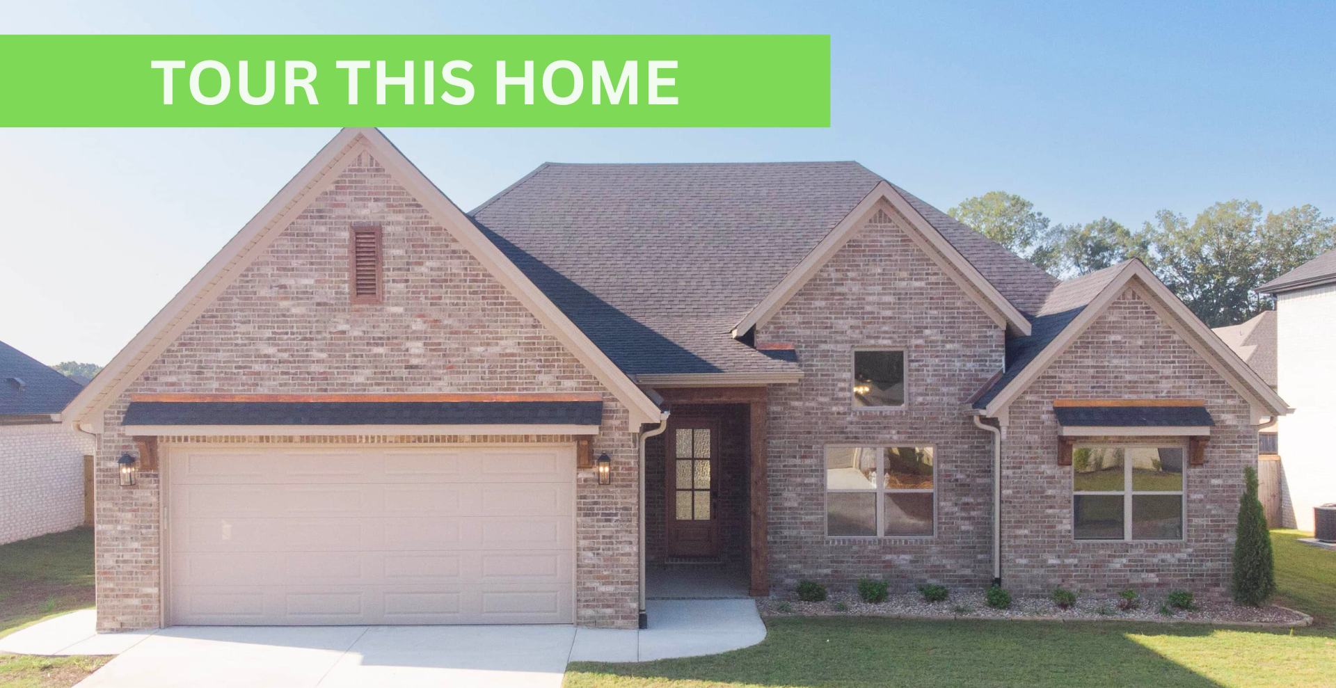 Simple custom home built by hines homes with dark brick and a white accent wall out front with a curved front porch
