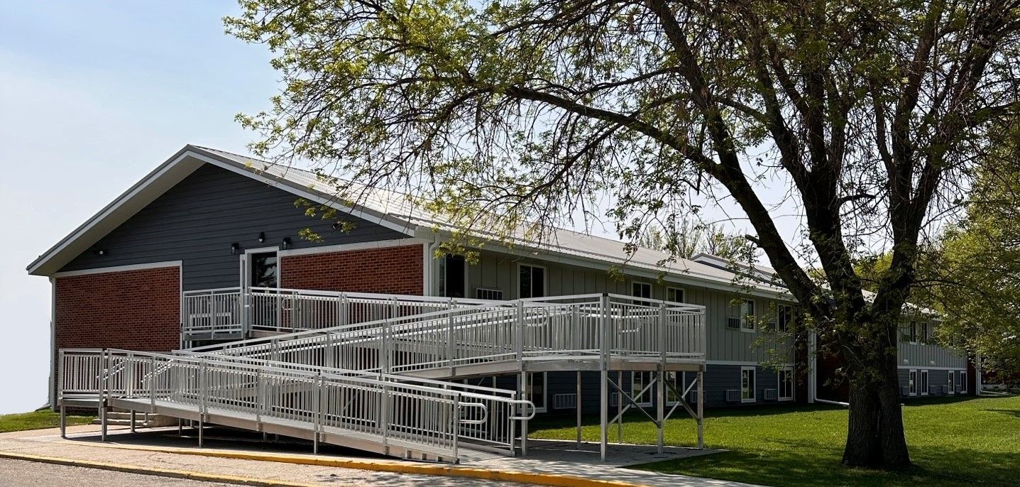 Leewood Apartments Building with ramp entrance