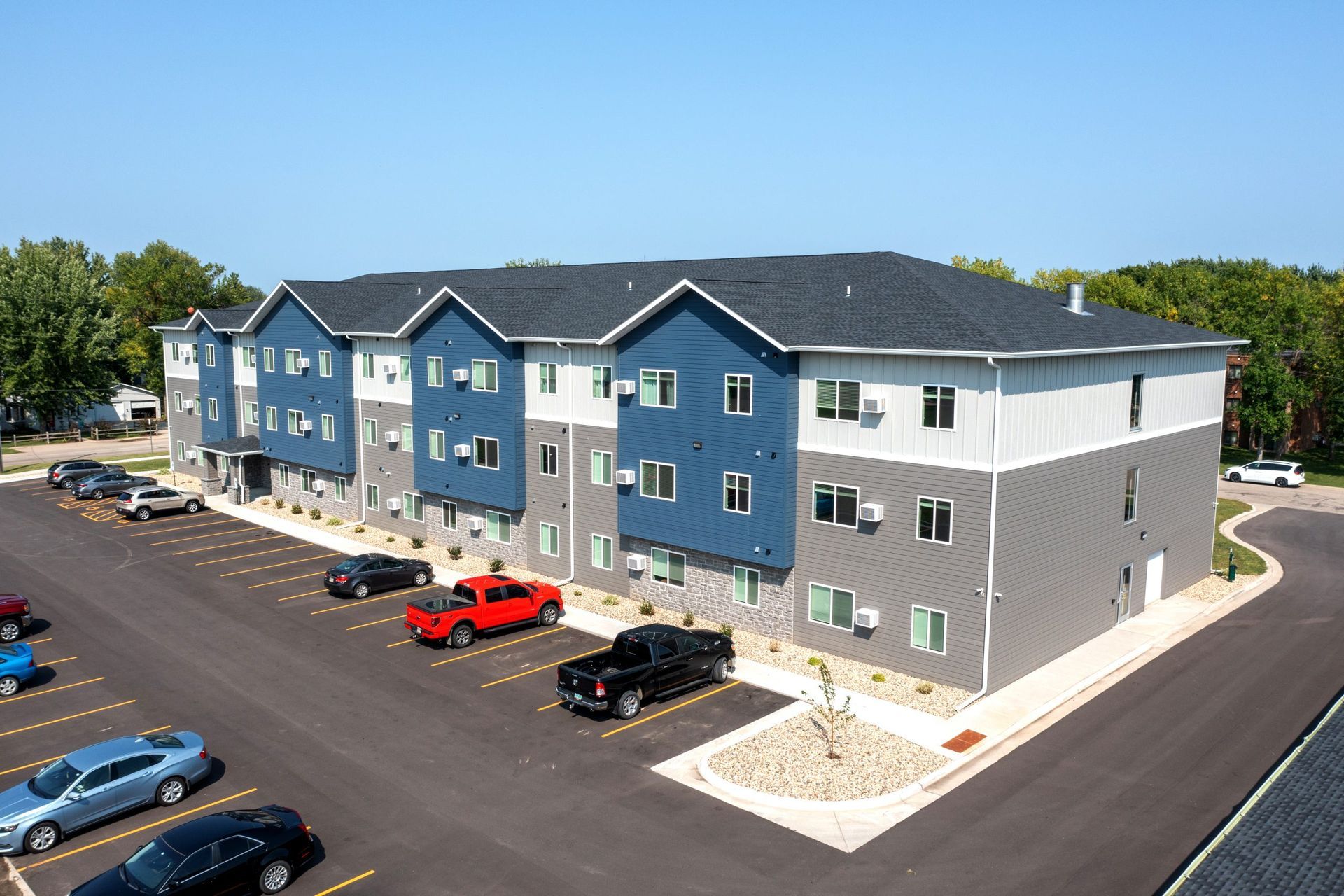 Rosewood Apartments Overview showing parking lot