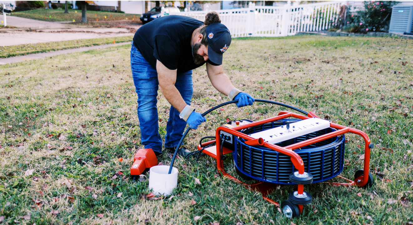 Expert performing trenchless sewer line repair in St. Charles.
