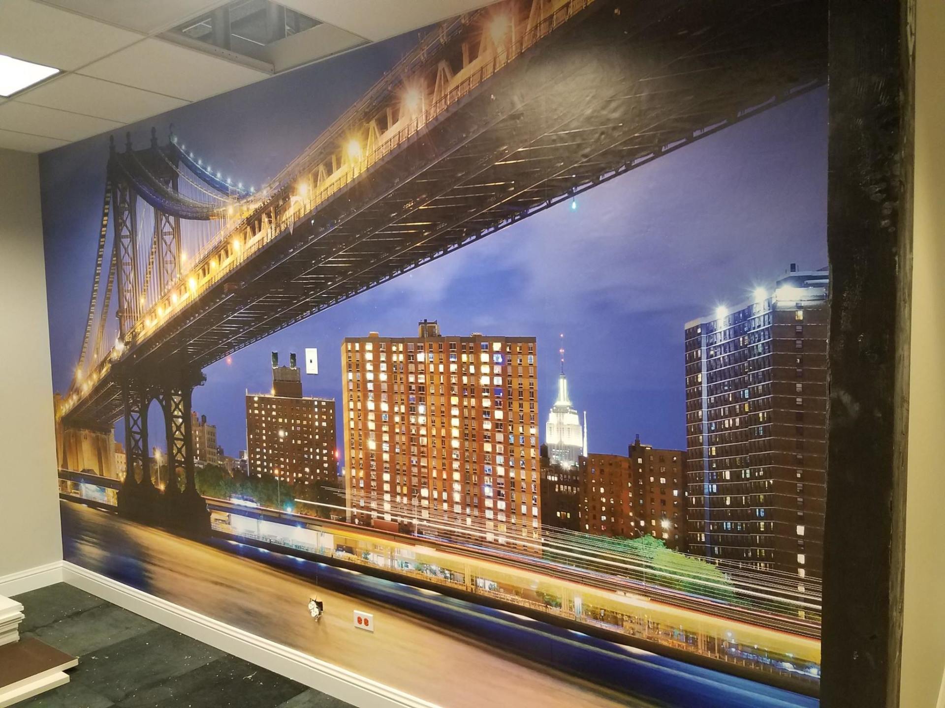 A large picture of a bridge over a body of water