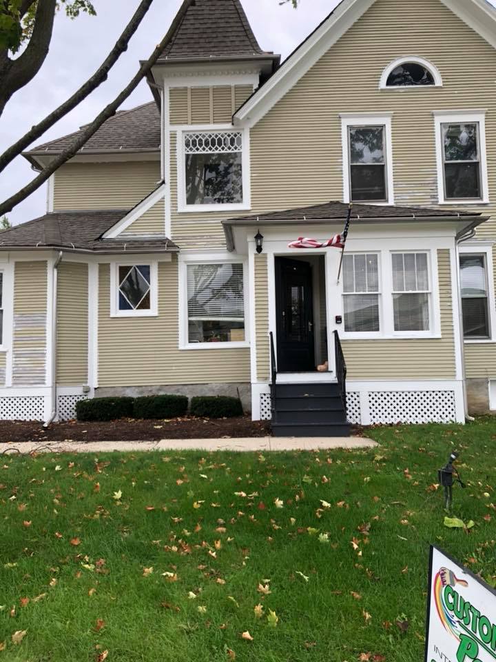 A house with a sign in front of it that says ' gatorade '