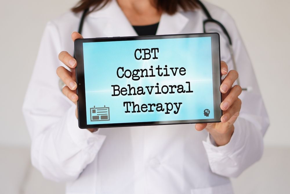 Doctor holding a tablet displaying 