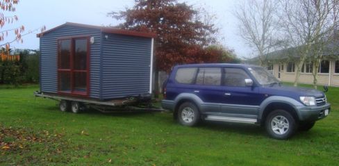 Contractor supervising installation of portable cabins in Waikato 