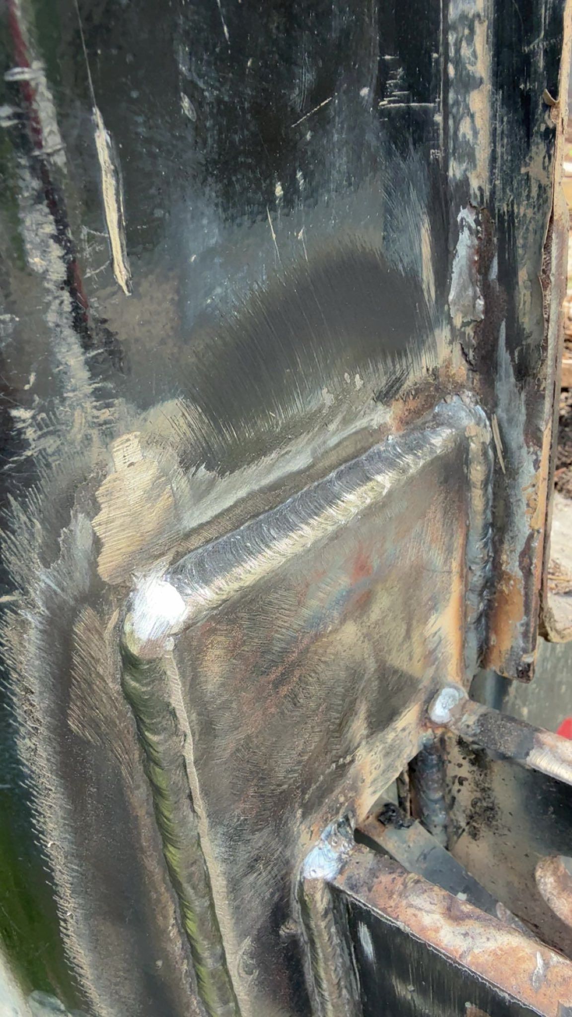 A close up of a piece of metal with a lot of dust on it.