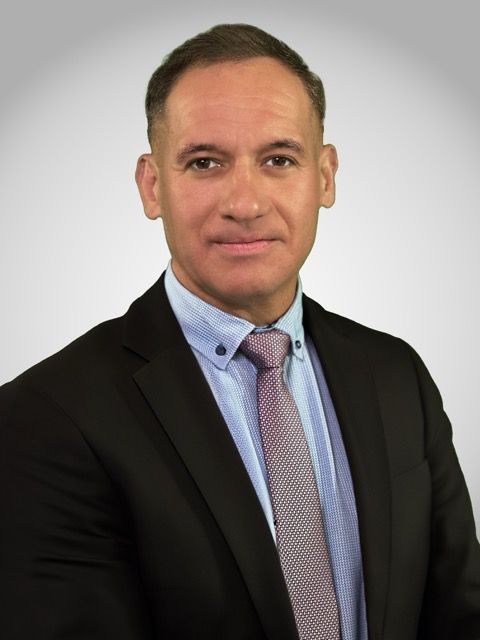 A photographer captures an event.