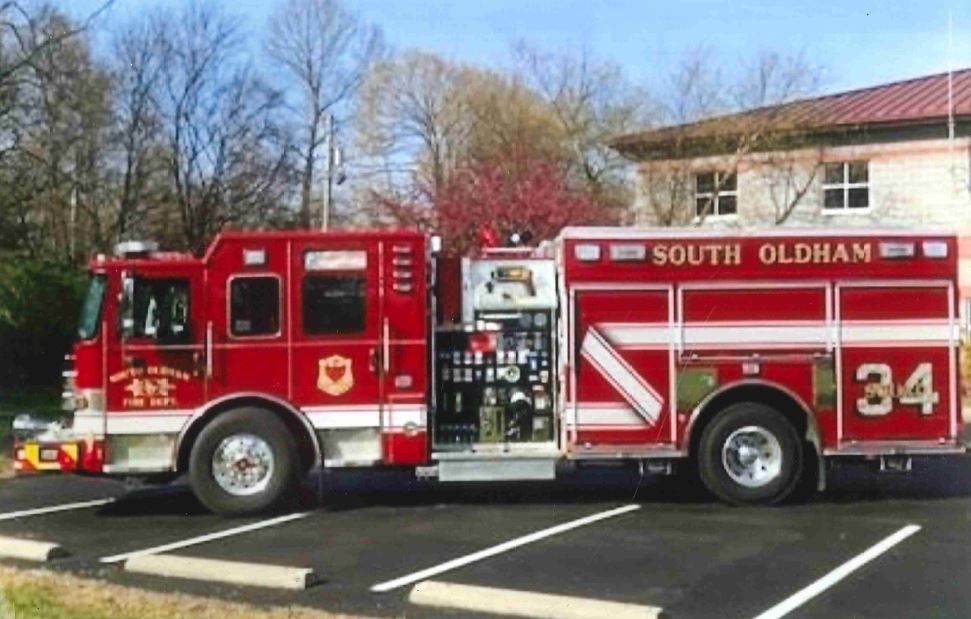 A south oldham fire truck is parked in a parking lot