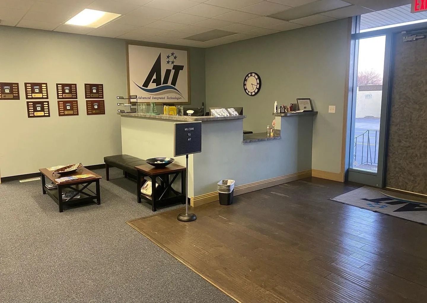 A waiting room with a sign that says ait on it