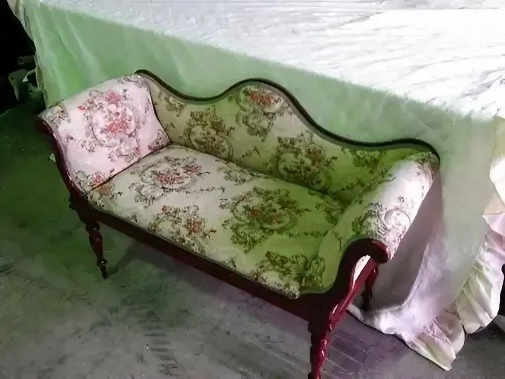 Floral Couch Is Sitting on A Table — Cachia Upholstery in Tuncurry, NSW