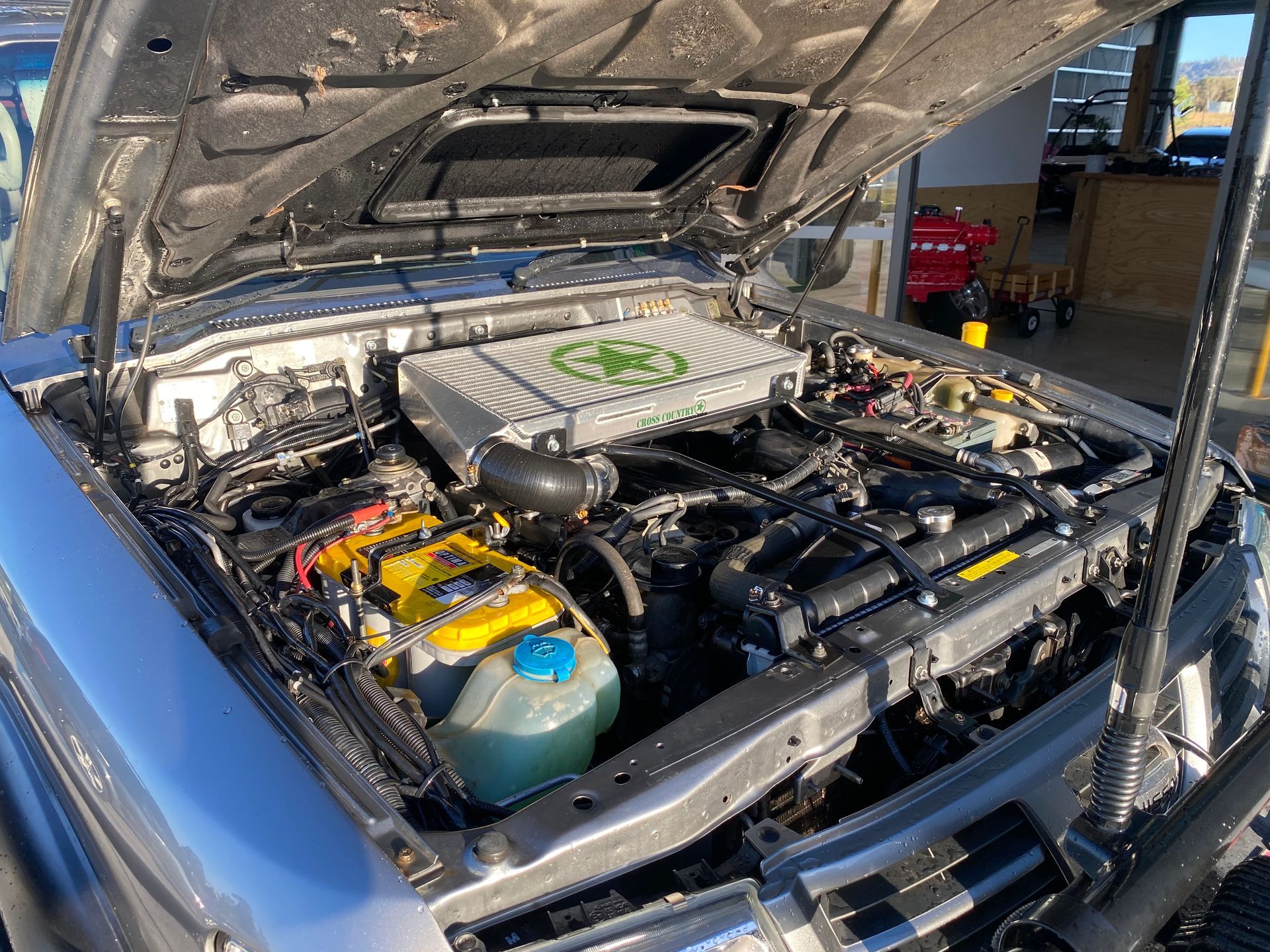 Blue Car getting service and maintenance completed — NG Mechanical Services in Thurgoona, NSW