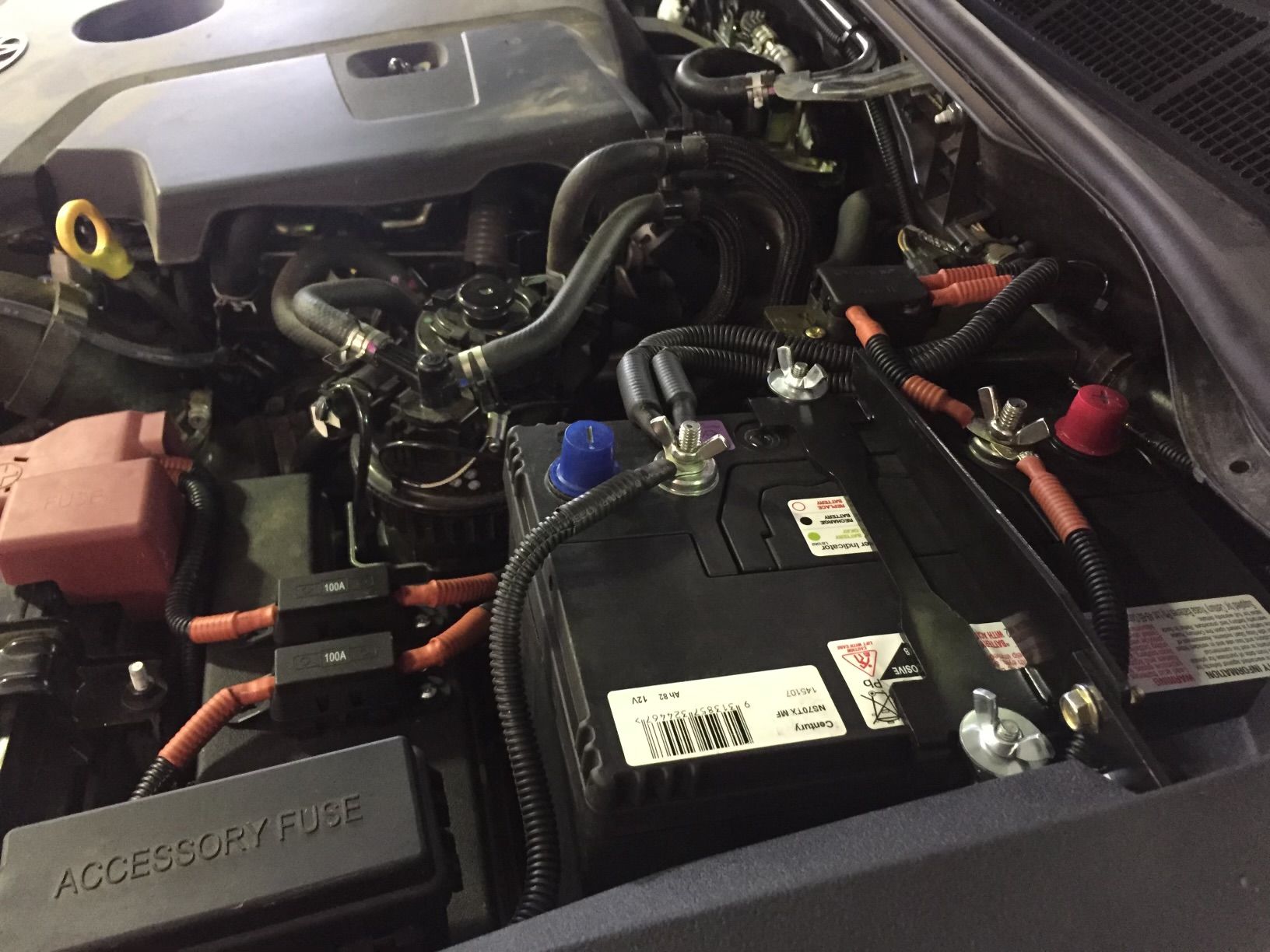 Car Battery is Being Charged With Jumper Cables — NG Mechanical Services in Thurgoona, NSW