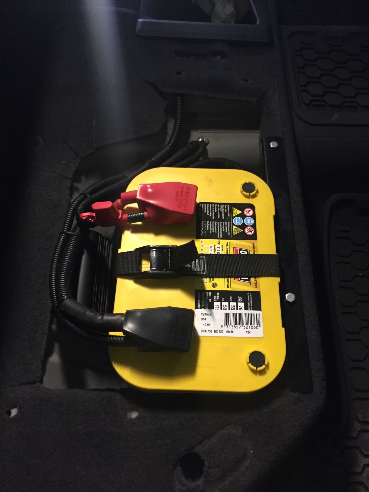 Car Battery is Sitting Under the Hood of a Car — NG Mechanical Services in Thurgoona, NSW